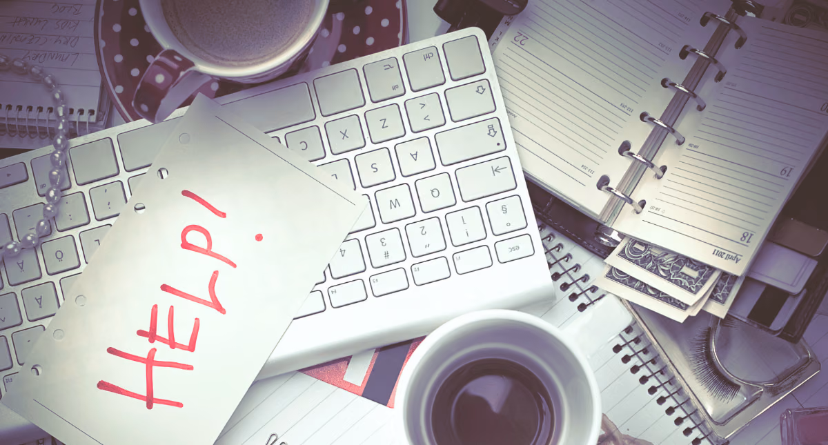 cluttered desk screaming for help