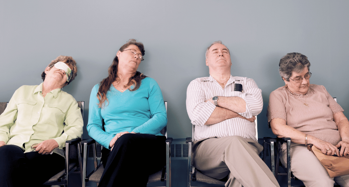 Exhausted people in a waiting room